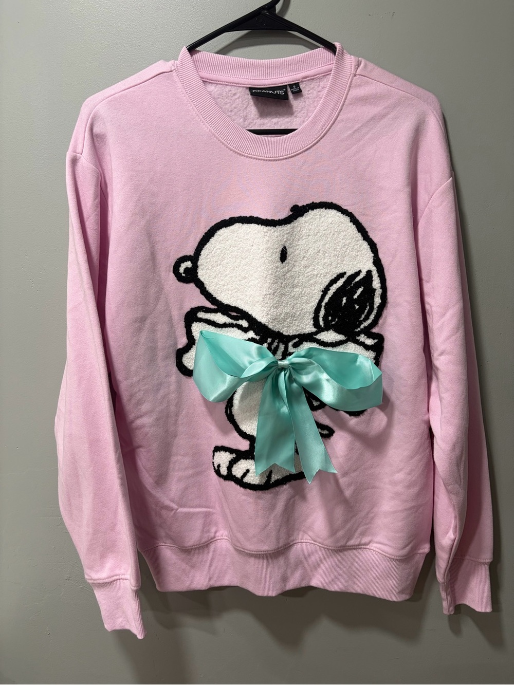 Peanuts Pink Snoopy Crewneck Sweater with Aqua Bow